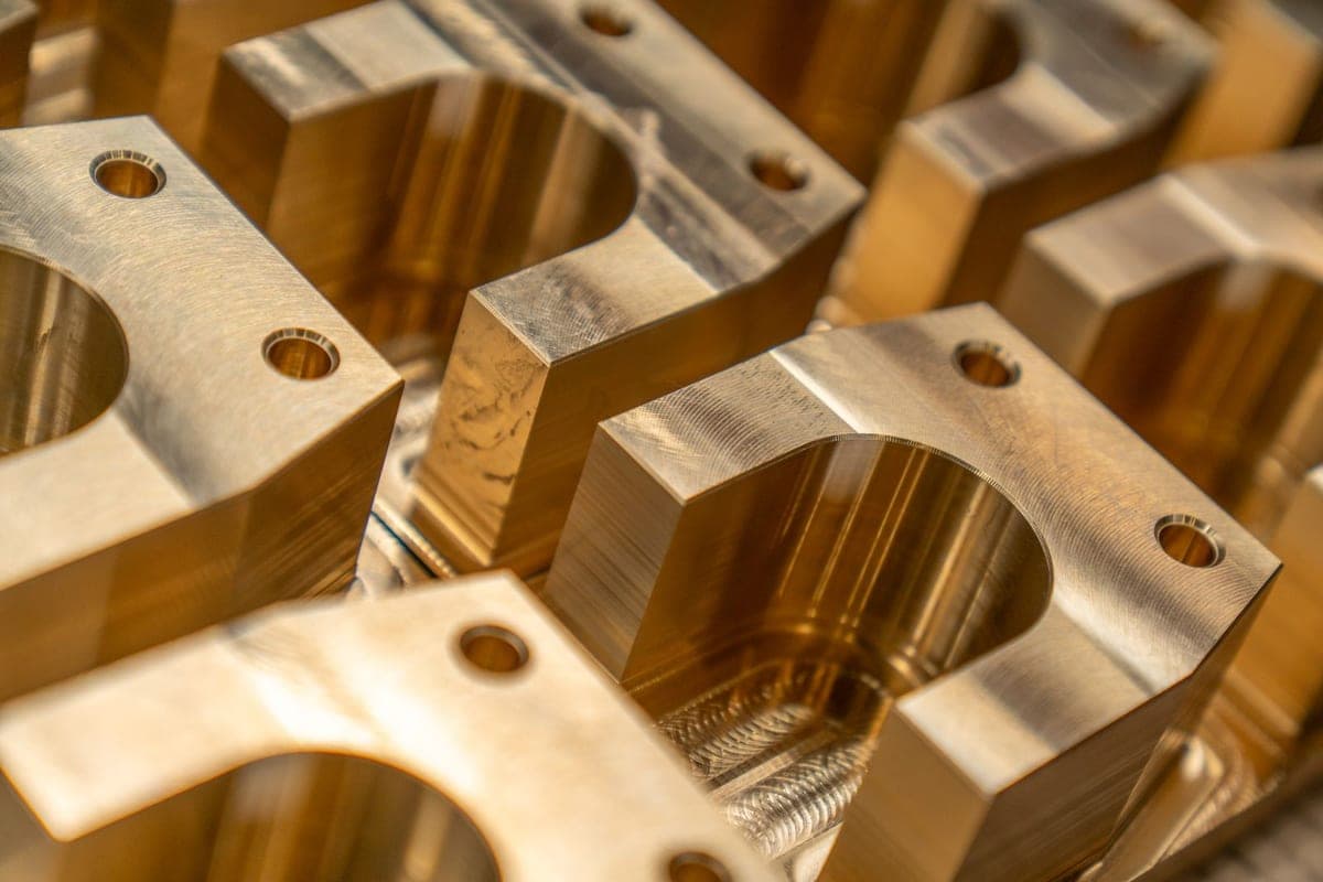 Precision-machined brass bearing blocks with a fine, uniform surface finish